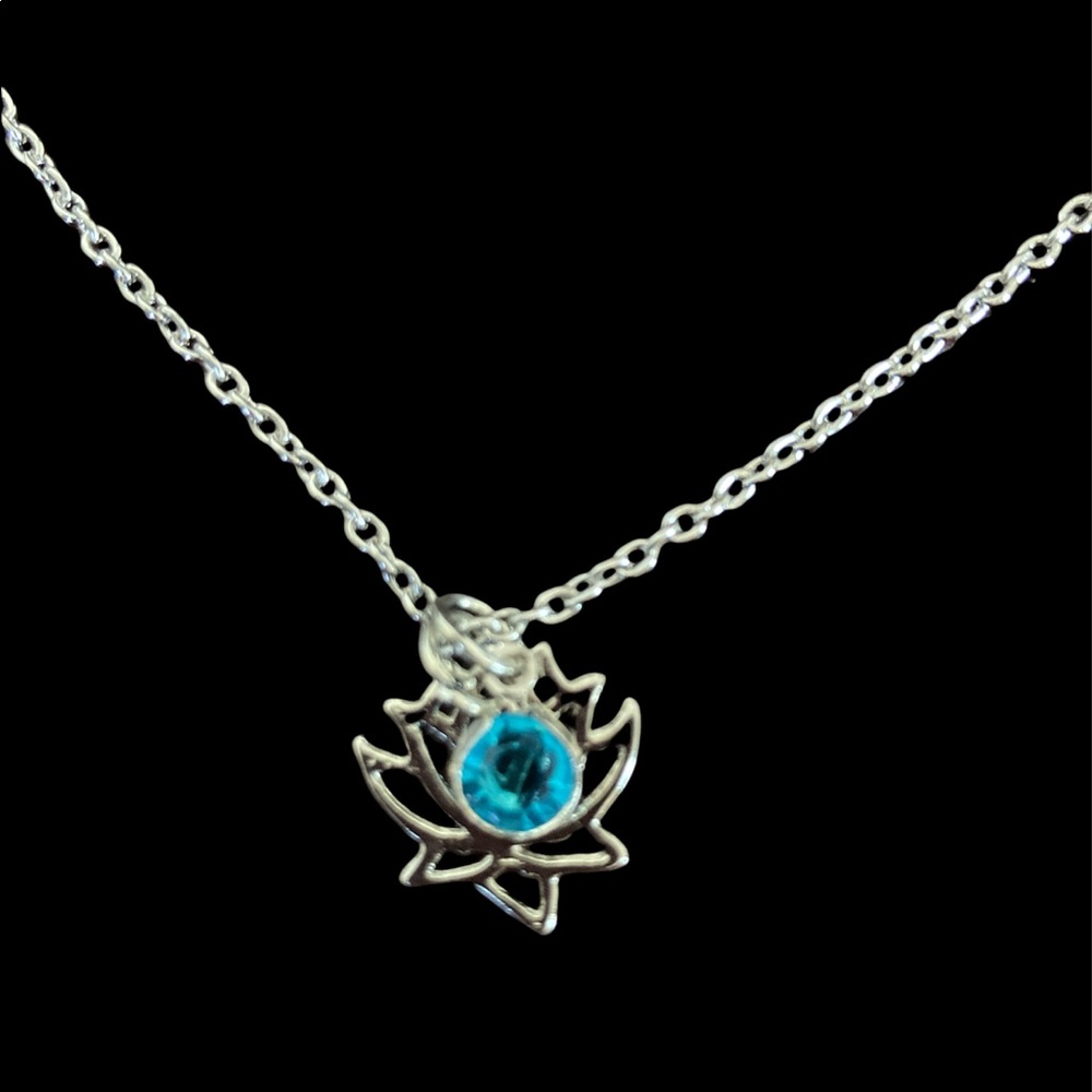 Silver lotus and gem necklace